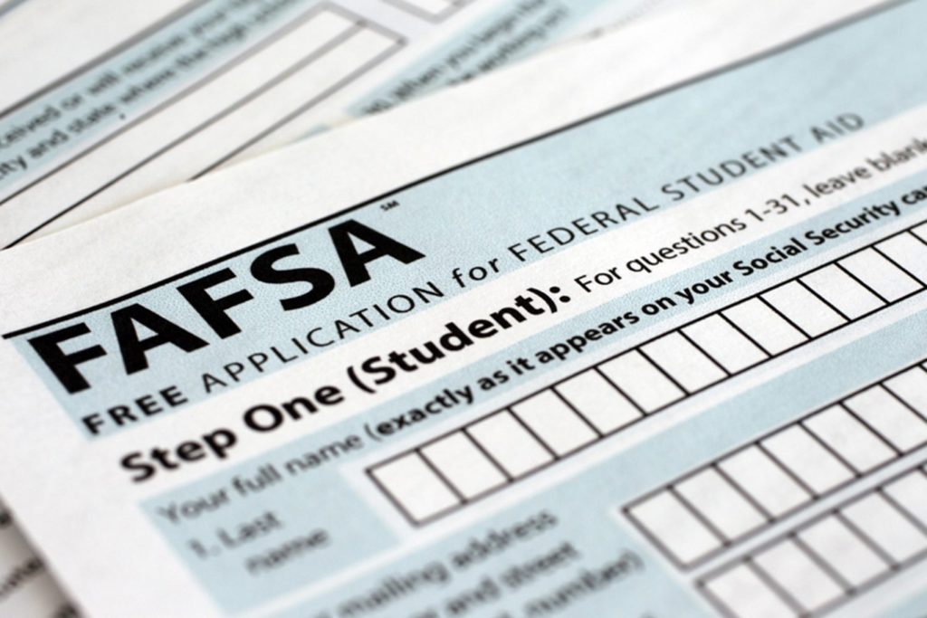 The Free Application for Federal Student Aid (FAFSA) form is photographed in Frederick, Md., Sunday, Jan. 26, 2014. (AP Photo/Jon Elswick)