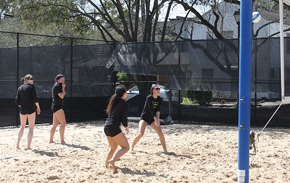 University of St. Thomas – Houston students play sand volleyball outside the Jerabeck Activity and Athletic Center 