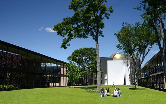 Students gather near the Chapel of St. Basil on the University of St. Thomas - Houston campus