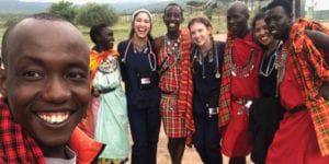 Nairobi, Kenya: Nursing students Jazmin Valdez, Abby Ringen and Victoria Ramos with members of the Maasai Mara Tribe